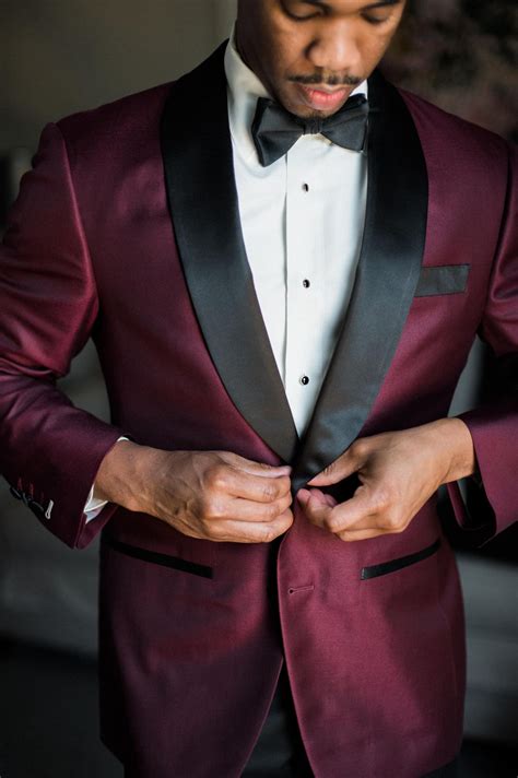 black suit with burgundy accents.